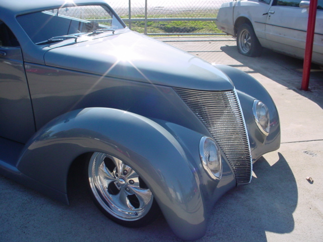 THIS 1937 FORD COUPE WAS IN FOR A LITTLE TOUCHUP